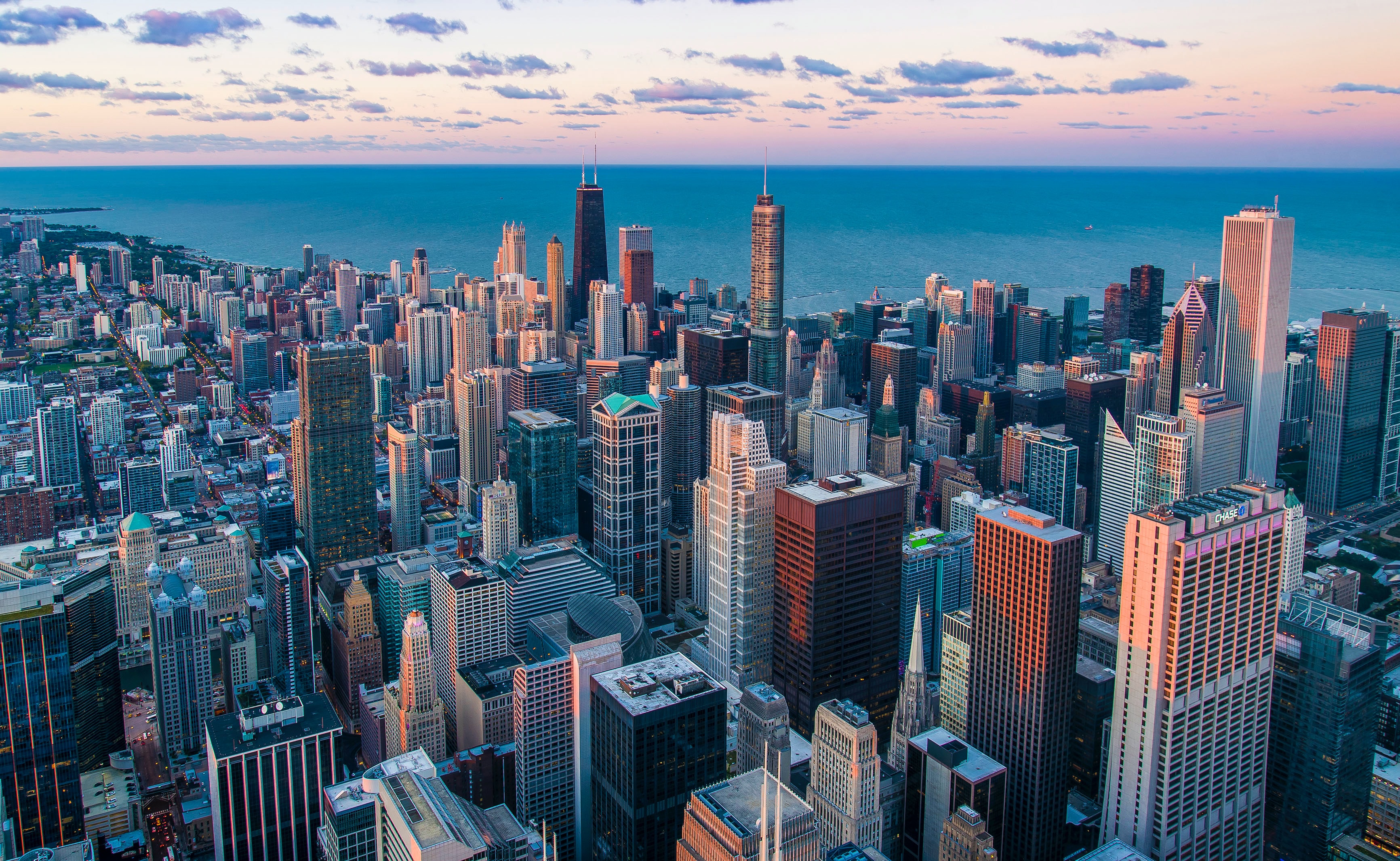 Large city with ocean on horizon