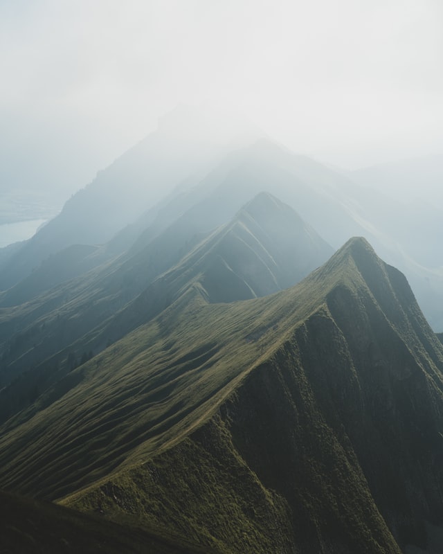Fog covering the ridge of a mountain range